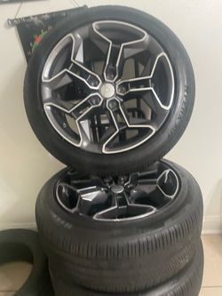 BRAND NEW 20in RIMS AND TIRED