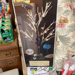  New in box decorative lead snow tree $20
