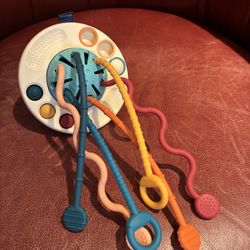 Moonkie’s UFO Silicone, Pulling and Pop Toy