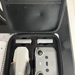 DJI Mini 2  – Ultralight Foldable Drone, 3-Axis Gimbal with 4K Camera, 12MP Photos, 31 Mins Flight Time, OcuSync 2.0 10km HD Video Trans