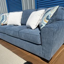 Brand New. Ashley Sofa. Blue. Only 1 Available. $449