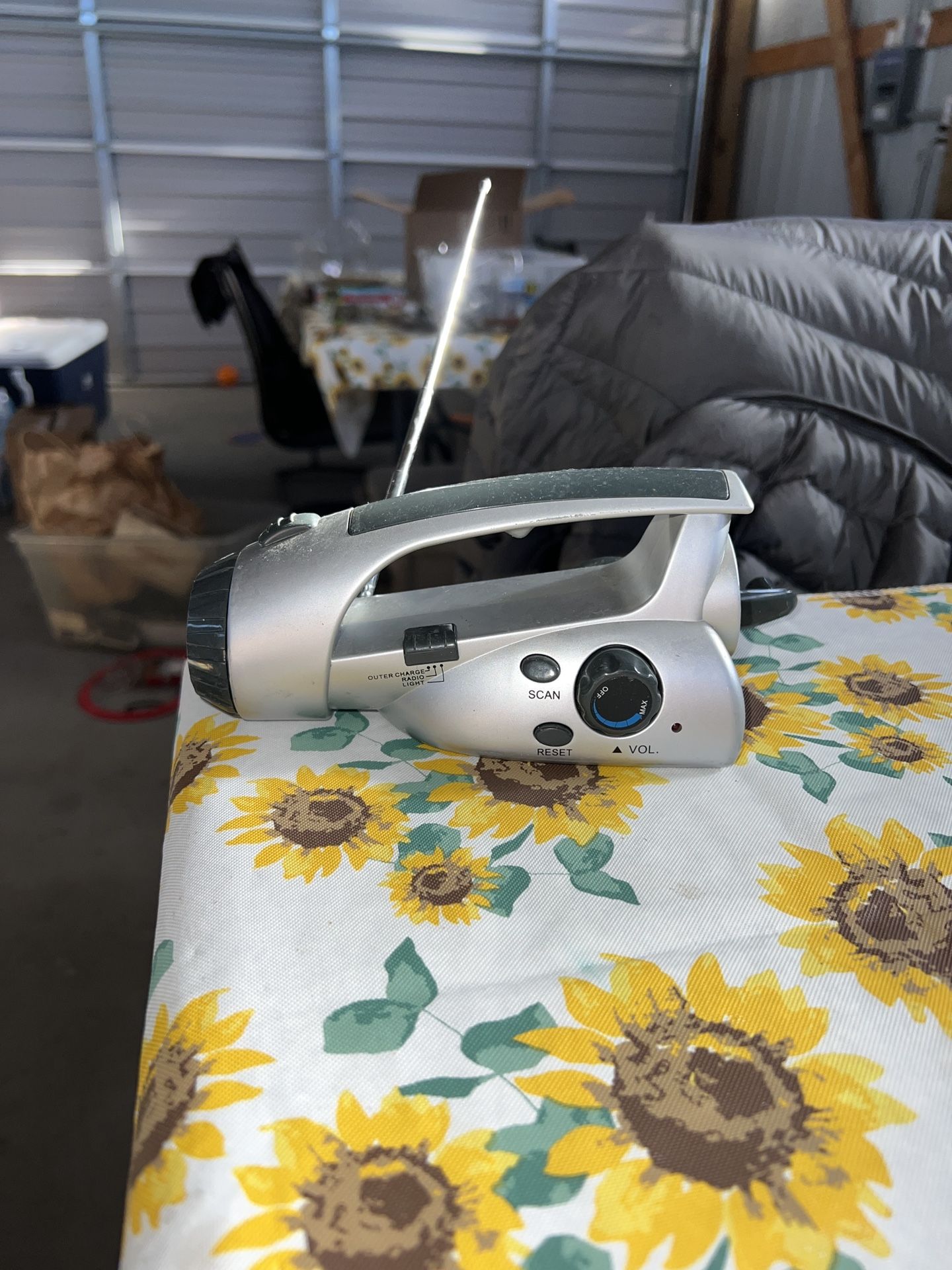 Battery-Free Wind Up Flashlight & FM Radio. No cord & the outer charge for radio doesn’t hold very long.