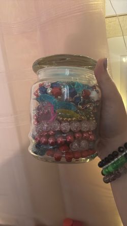 Jewelry Jar with random pieces of bracelets/necklaces/earrings