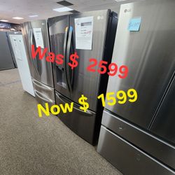 Twenty eight cubic feet three door french door refrigerator with ice and water dispenser craft ice in black stainless steel