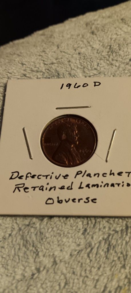 1960 D,error S,Defective Planchet_ Retained Lamination Obverce