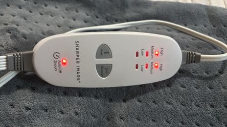 Calming heat massaging pad by sharper image size 24”x 12” color gray