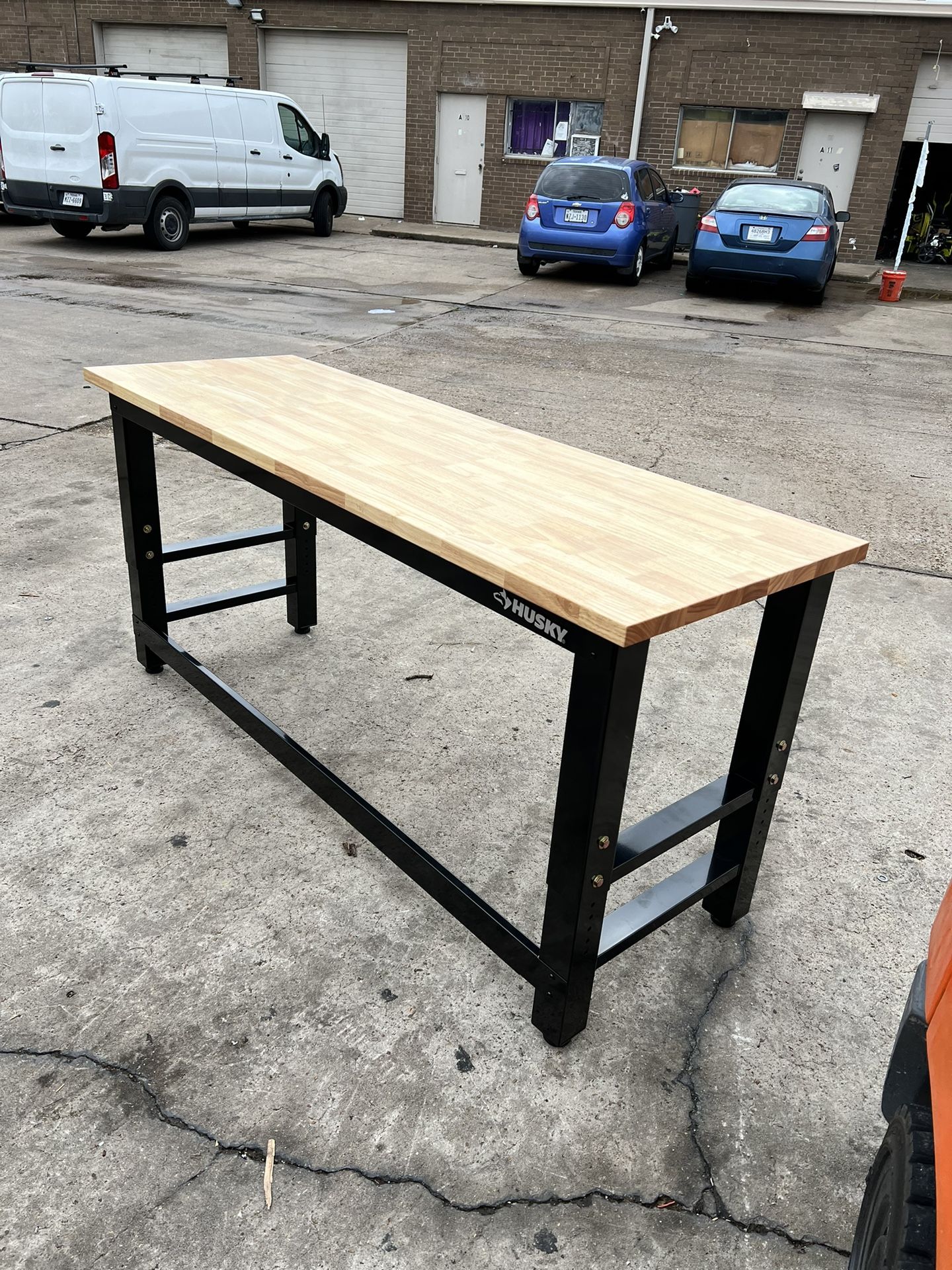 Husky 6 ft. Adjustable Height Solid Wood Top Workbench in Black for