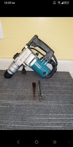 Makita rotary hammer drill with 3 small bits in excellent working condition