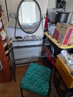 Metal vanity with glass top