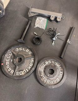 Wallet Mount Pulley System with 2” Olympic Weights.