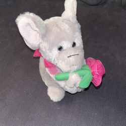 Elephant Holding A Rose