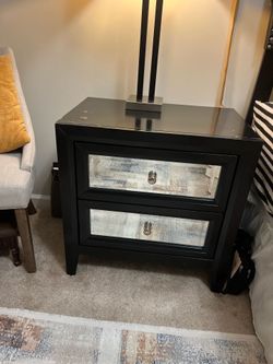 2 black wood and mirror nightstands