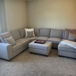 Gray Sectional With Chaise And Ottoman