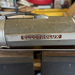1950s Electrolux Model LX Canister Vacuum Working with Accessories