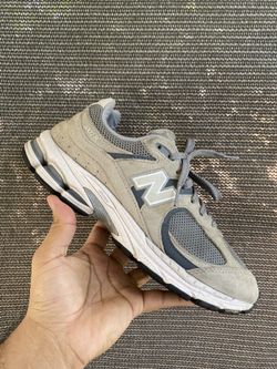 New Balance 2002R lifestyle sneakers in the Steel Grey / Orca colorway 