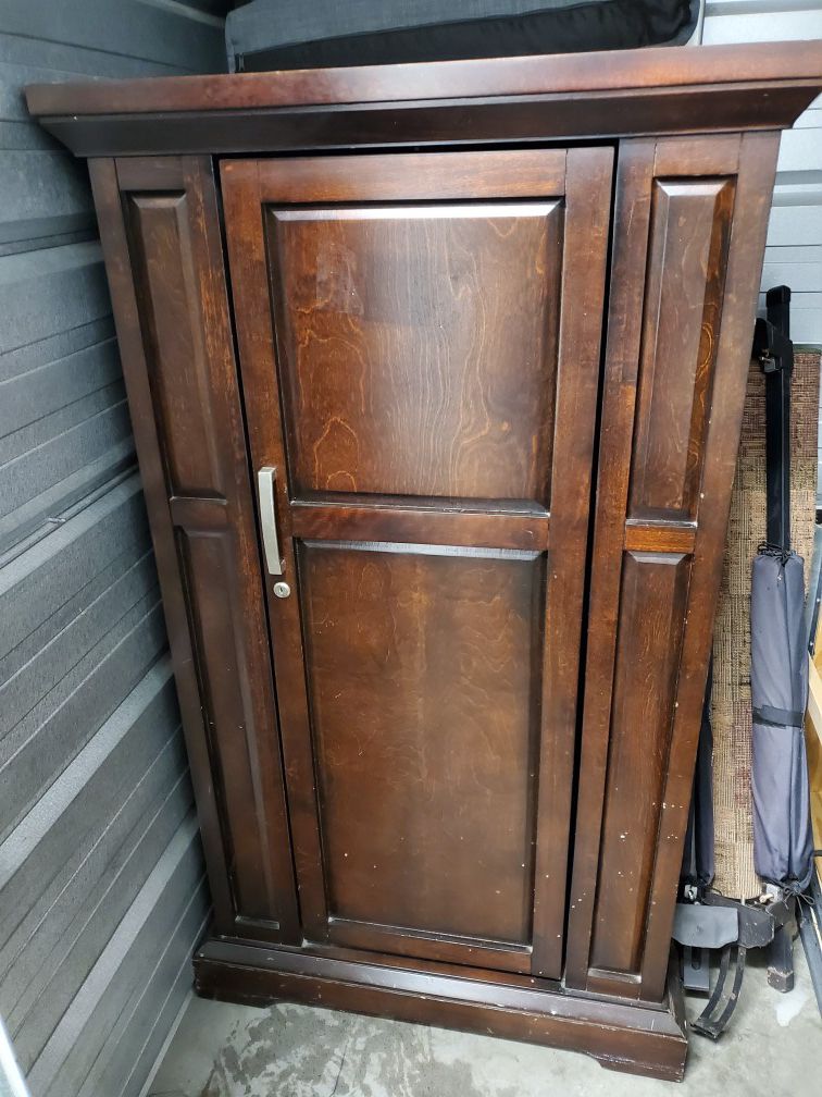 Liquor Cabinet with rotating front and side doors OBO (Or Best Offer)