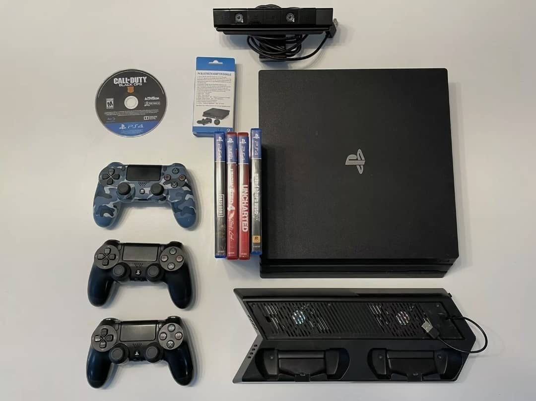 SALE] Sony PS4 Pro 1TB + 2x controllers and charger + 4 games