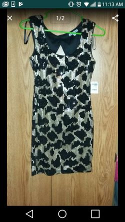 Black and gold sequence dress