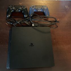 PS4 Slim Edition + 2 Wireless Controllers