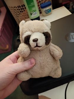 A Light Gray Teddy Bear plush toy