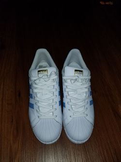 New Adidas size 10.5 brand new in box