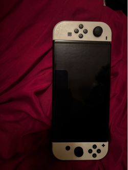 Nintendo Oled (NON WORKING, NEEDS BATTERY )