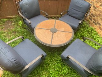 Patio set: granite top table with 4 rocking chairs