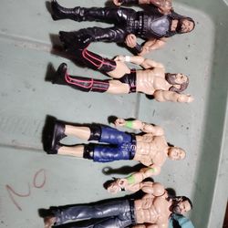 4 WWE action figures