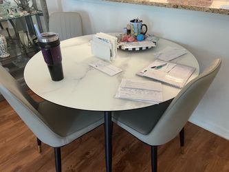 48” inch round dining table & 4 grey vinyl chairs