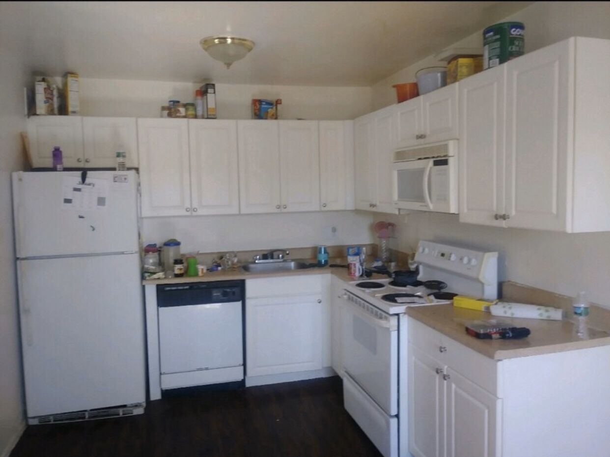 Entire kitchen 4sale, white wood cabinets, refrigerator, range, microwave