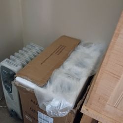 A portable washing machine in bathtub for clothes