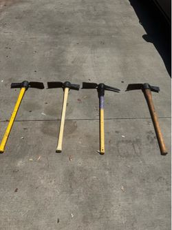 Mattocks rubber handles $20 each/cada uno