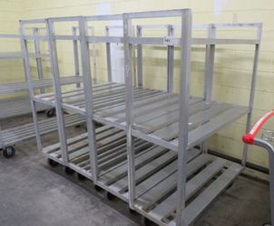 Commercial Aluminum freezer/cooler shelves and Carts shelving without wheels start at $50 with 2 sheves and the ones with wheels start at $150-$200 ea