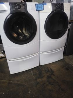 Kenmore front load washer and dryer set with pedestals working perfectly