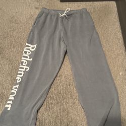Large Blue uncuffed pacsun sweats with white script