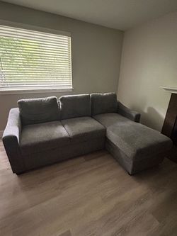 Modular L-Couch with storage and pull-out sleeper