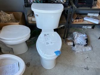 KOHLER Kingston The Complete Solution Two-Piece Elongated Toilet – White