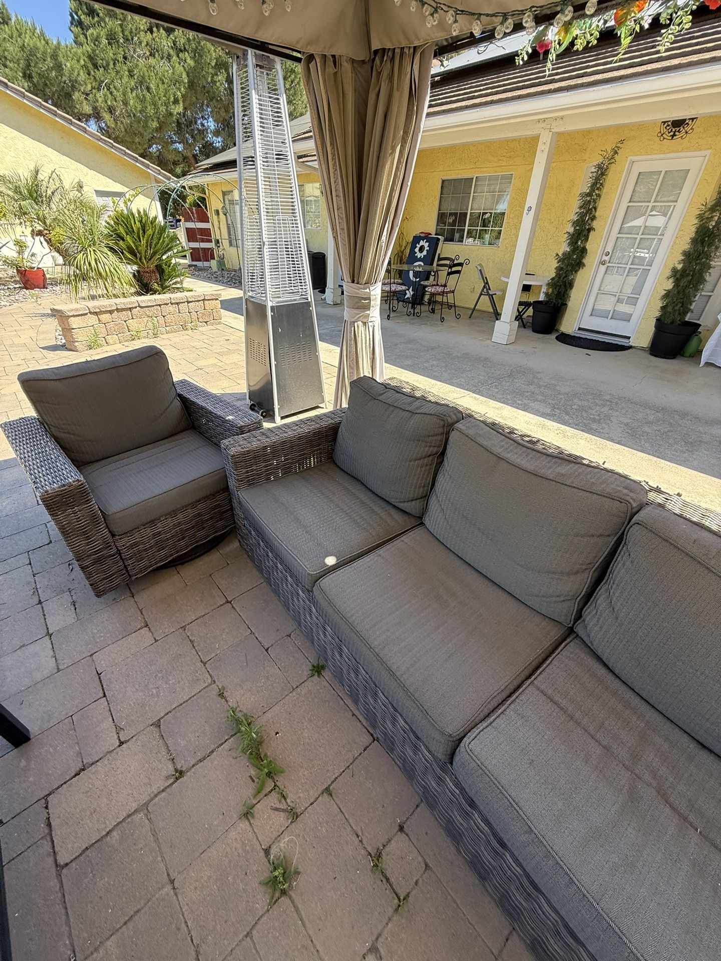 Free Wicker Sofa and 2 Swivel Rockers