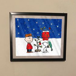 Charlie brown and snoopy christmas tree art piece on black frame