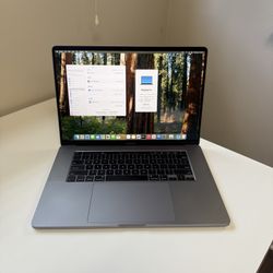 Apple 16” MacBook Pro 2019 Touch Bar Retina 2.3ghz Intel 8-Core i9 16gb RAM 1TB SSD macOS Sequoia 4GB Dedicated Graphics Card AMD Radeon Pro 5500M