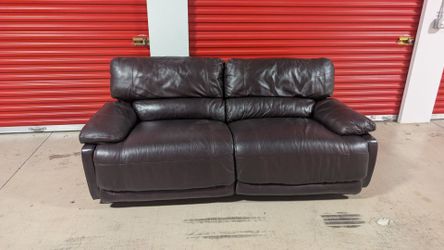 Dark leather recliner couch
