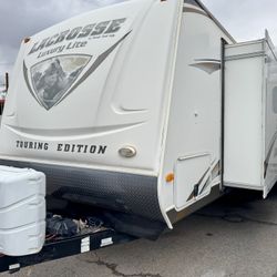 2012 Lacrosse Luxury Lite 34ft travel trailer with 2 large slide outs 