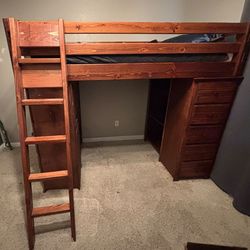 Loft bed with desk, bookshelf and drawers