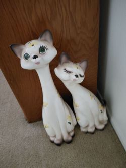 Porcelain cats.