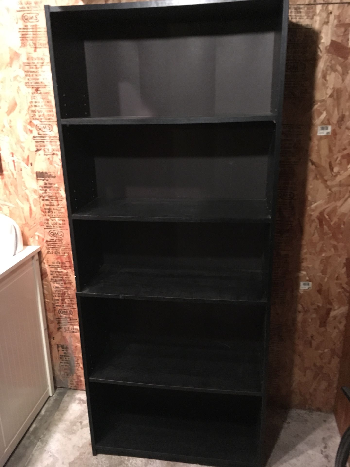 Walmart and IKEA black bookshelves