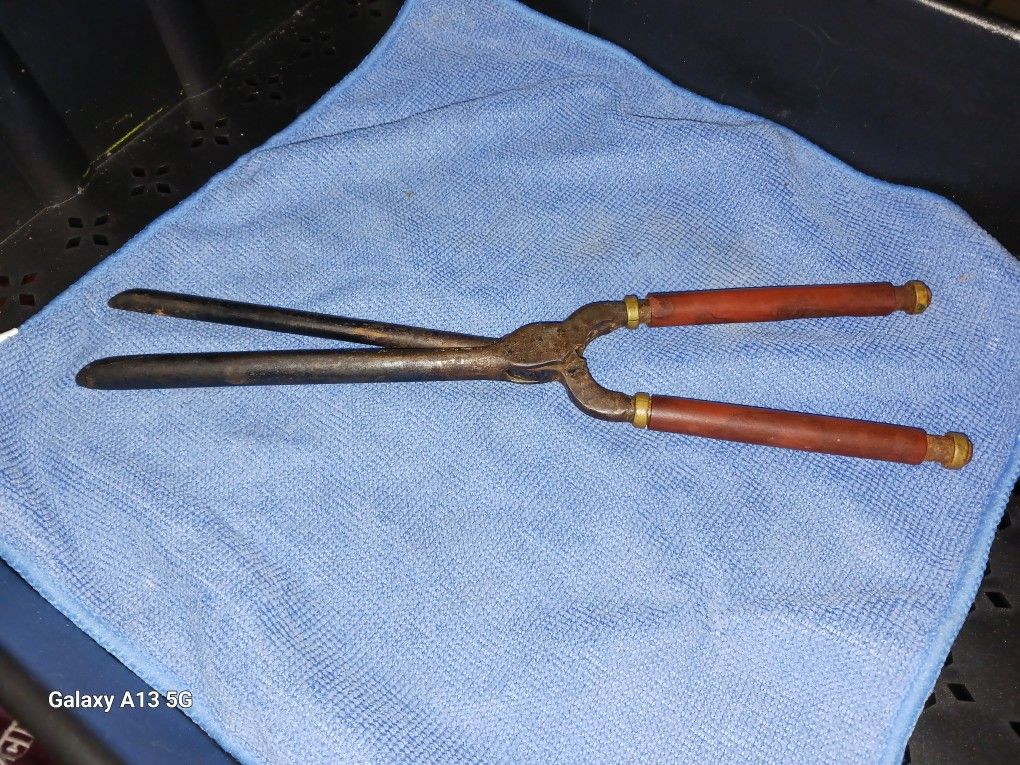 Àntique Curling Iron