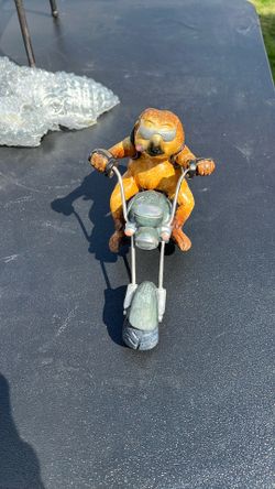 Sloth on motorcycle
