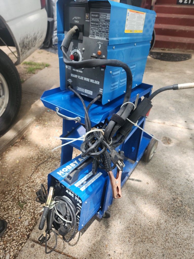 90 Amp Flux Wire Welder Plus Cart Plus Hobby Arc 110 Welder Plus Two Welder Masks