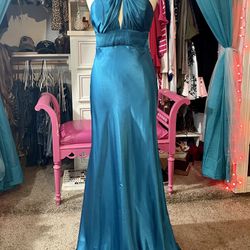 Woman’s Teal Gown