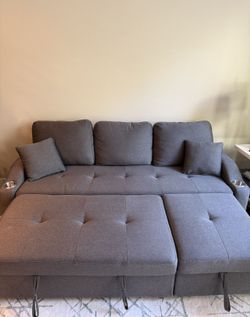 Like New! Grey Extendable Sofa .Priced To Sell Fast!